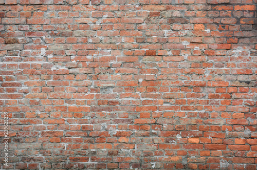 old vintage and grunge red brick wall background texture with scratches and cracks