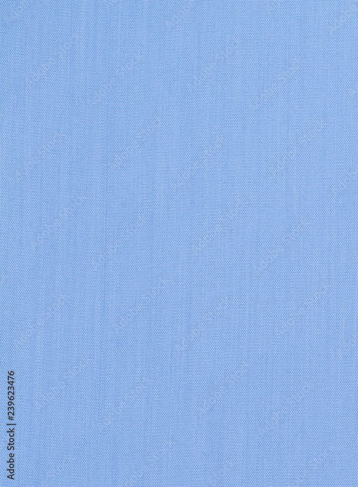 the blue background of the texture of the fabric. empty. no pattern the blue background of the texture of the fabric. empty. no pattern