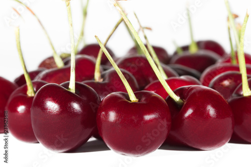 Cherries Close-up on a White Backdrop