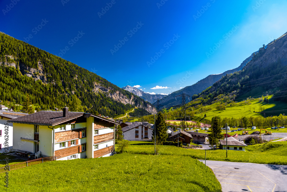 Fototapeta premium Chalet and hotels in swiss village in Alps, Leukerbad, Leuk, Vis