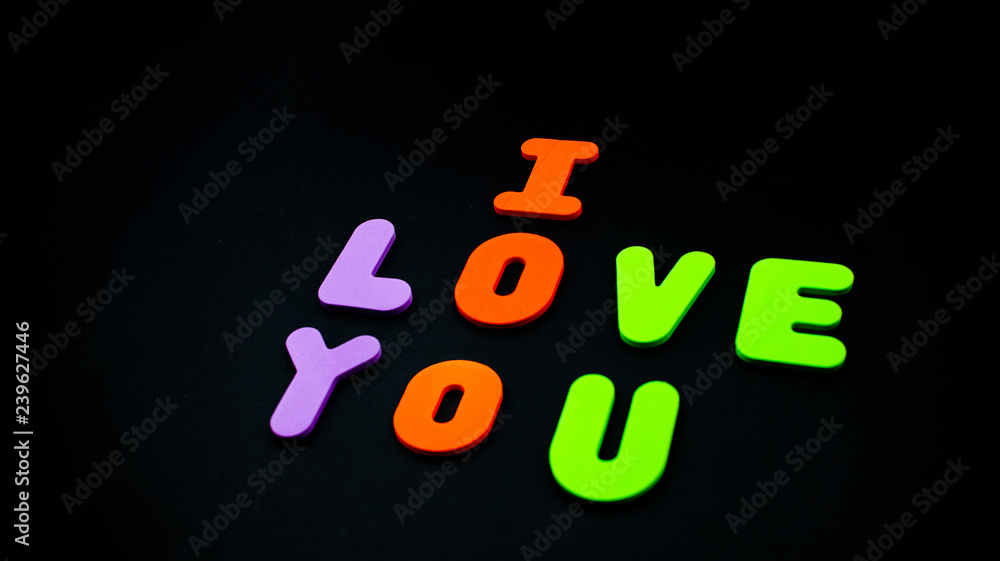 Foam English aphabet letters. I love you with bright letters. Saint Valentine 14 February Concept.