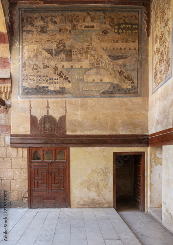 Stone wall decorated with mural depicting Istanbul city at ottoman historic Beit El Set Waseela building (Waseela Hanem House), Old Cairo, Egypt photo