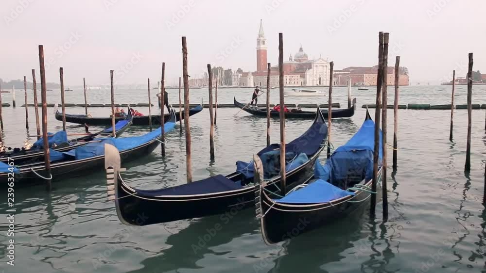 Classic view of Venice with gondola in canal from San Marco Square Classic view of Venice with gondola in canal from San Marco Square