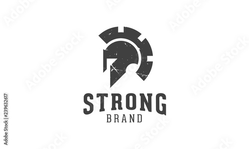 A vector spartan logo that represents a combination of spartan helmet and gear. 