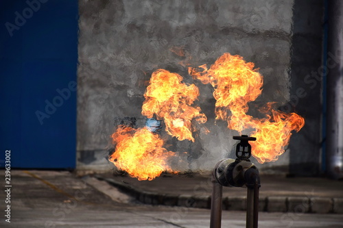 Wallpaper Mural Gas pipeline leaks at the joints with the valve. Spark and Fire on the gas pipeline. An explosion at the gas pipeline. Torontodigital.ca
