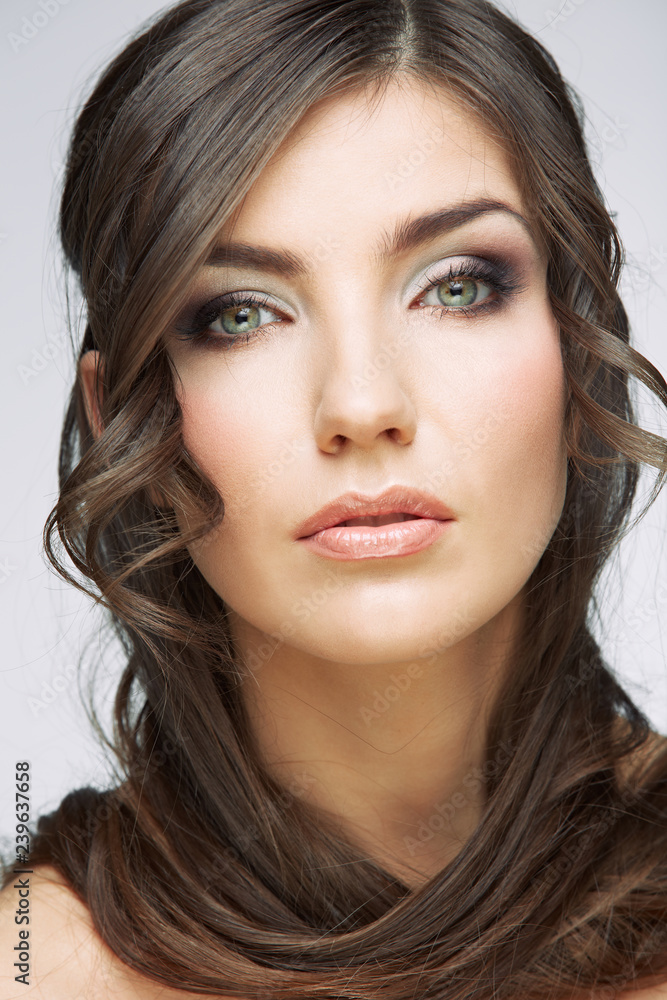 Close up face portrait in beauty style of young woman with curly Close up face portrait in beauty style of young woman with curly