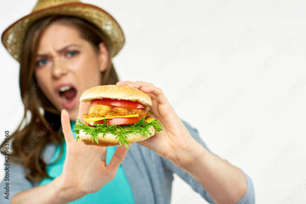 Refusal to eat fast food concept photo with woman Refusal to eat fast food concept photo with woman