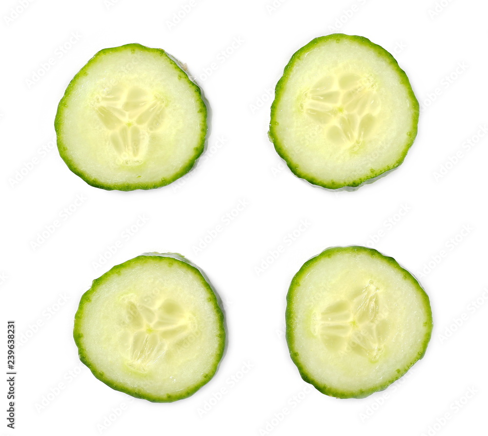 Fresh sliced cucumber isolated on white background, top view Fresh sliced cucumber isolated on white background, top view