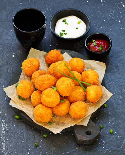 cheese balls with tomato sauce. photo