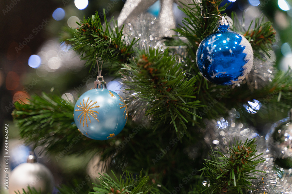 Close-up Christmas decorations. blue and silver balls and stars. Close-up Christmas decorations. blue and silver balls and stars.