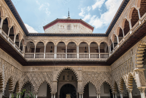 Beautiful architecture of the famous Alcazar of Seville Royal Palace. It is one of the most famous historical palaces in Spain and boasts of the finest architectural beauty.