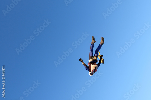 Skydiving. Alone man is in the sky.