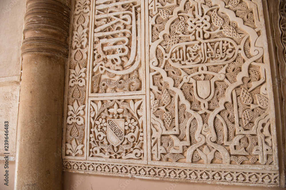 Closeup of a beautiful medieval time architecture seen inside Alhambra Palace. The architecture seems apalling and stunning with details. The design is similarly fascinating.