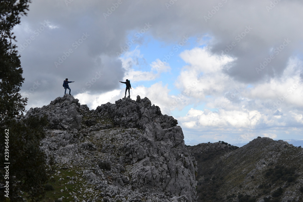Hiking on mountains in Sierra de Grazalema Natural Park, province of Cadiz, Andalusia, Spain, towards Benamahoma