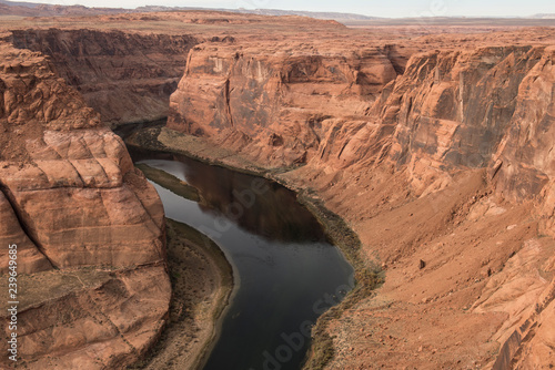A distant look at the horseshoe bend of river in Canyon. It is a bright sunny day and the river looks beautiful from distance.