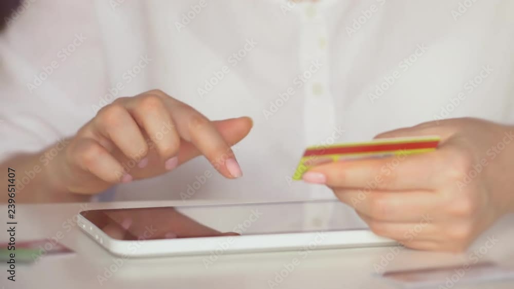 Online banking with smart phone and tablet . Lifestyle. Easy pay using smart phone or digital device. Communication via app for sale in shop. Beautiful woman shopping online with credit card. Online banking with smart phone and tablet . Lifestyle. Easy pay using smart phone or digital device. Communication via app for sale in shop. Beautiful woman shopping online with credit card.