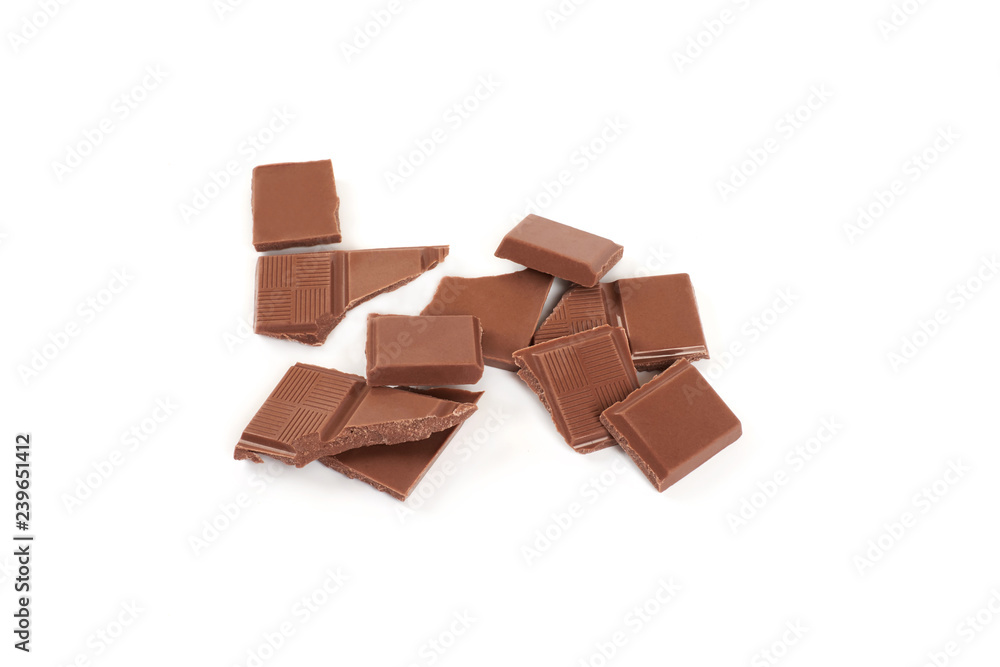 pieces of milk chocolate bar isolated on white background. pieces of milk chocolate bar isolated on white background.