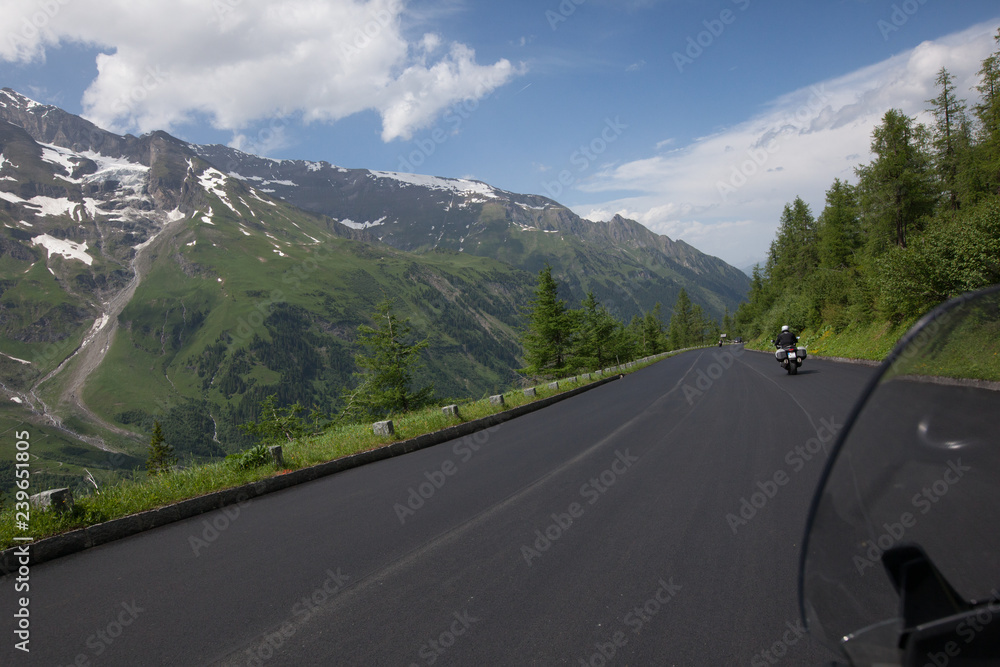 Motocyclists driving on a mountain route