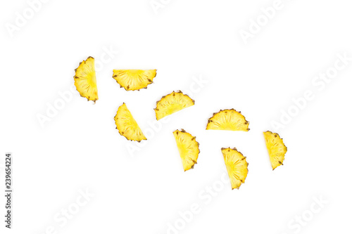 Tropical fruit concept. Slice of pineapple on white background. Flat lay, top view.