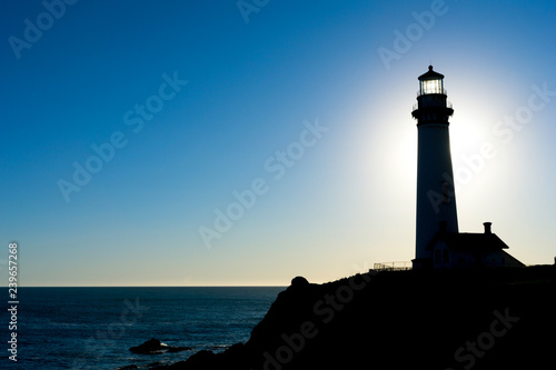 Lighthouse Silhouette at Sunset