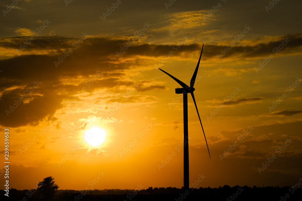 Wind turbine farm or windmill on golden sunset sky in summer day. High-quality stock photo image of wind turbine or windmill for clean energy concept. Energy Production with clean and Renewable Energy Wind turbine farm or windmill on golden sunset sky in summer day. High-quality stock photo image of wind turbine or windmill for clean energy concept. Energy Production with clean and Renewable Energy