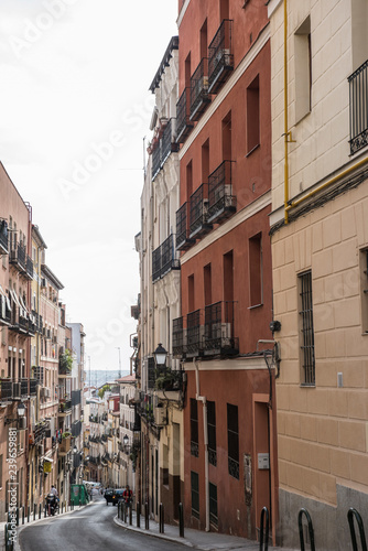 Exterior of a local building in Spain. The building seems to be a mix of old and modern architecture. The Streets seem to be narrow. It seems to be a sunny day. © EugeneF