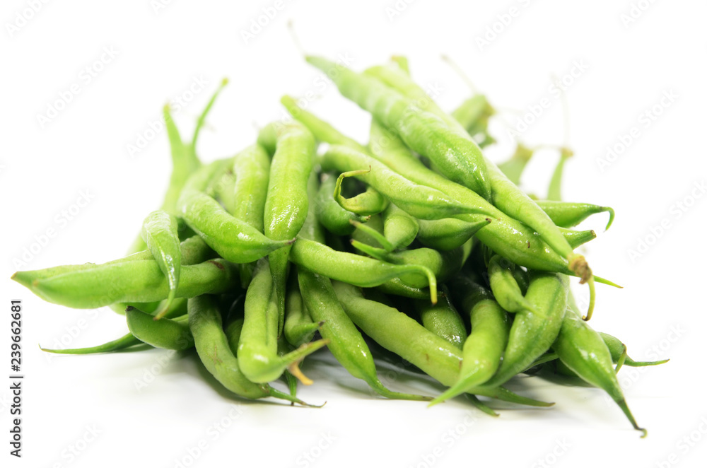 Pile of raw green baby fine beans Pile of raw green baby fine beans