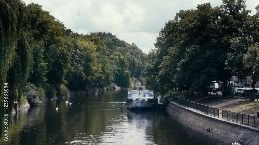 Idyllic Landwehrkanal (Canal) in Kreuzberg with Boats and Swans in the Summer Idyllic Landwehrkanal (Canal) in Kreuzberg with Boats and Swans in the Summer