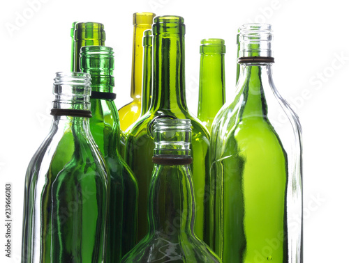 Empty glass wine bottles on a white background