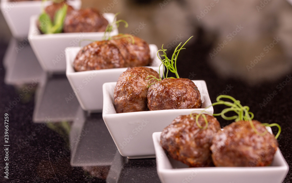 Quenelles meat with greens Quenelles meat with greens