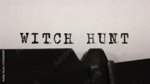 Accusations, persecution and harassment. WITCH HUNT typed on an old mechanical typewriter.