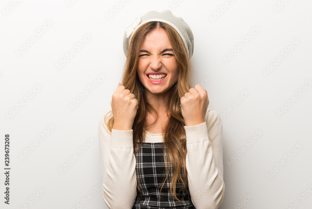 Fashionably woman wearing hat frustrated by a bad situation Fashionably woman wearing hat frustrated by a bad situation
