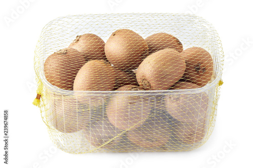 Kiwifruit also known as kiwi or Chinese gooseberry in transparent packaging container box isolated on white background