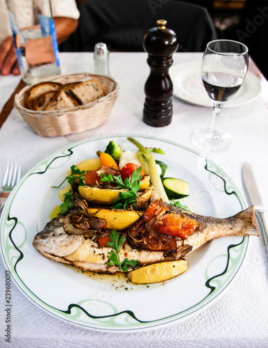 Fish dish - roasted fish, vegetables and lemon