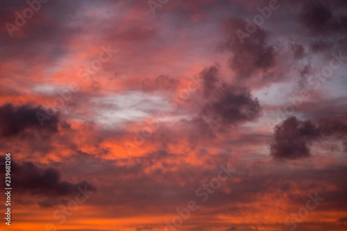 dramatic high contrast clouds in sunset over seaside beach © Martins Vanags