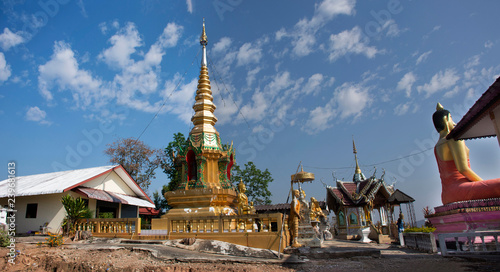 Stupa chedi and buddha statue images in Wat Phrachao Thanchai and Phra That San Kwang temple at Chiangrai city in Chiang Rai, Thailand