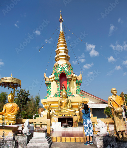 Stupa chedi and buddha statue images in Wat Phrachao Thanchai and Phra That San Kwang temple at Chiangrai city in Chiang Rai, Thailand