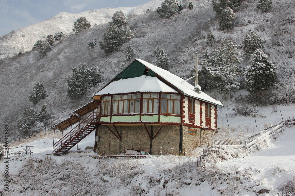 old wooden house in winter