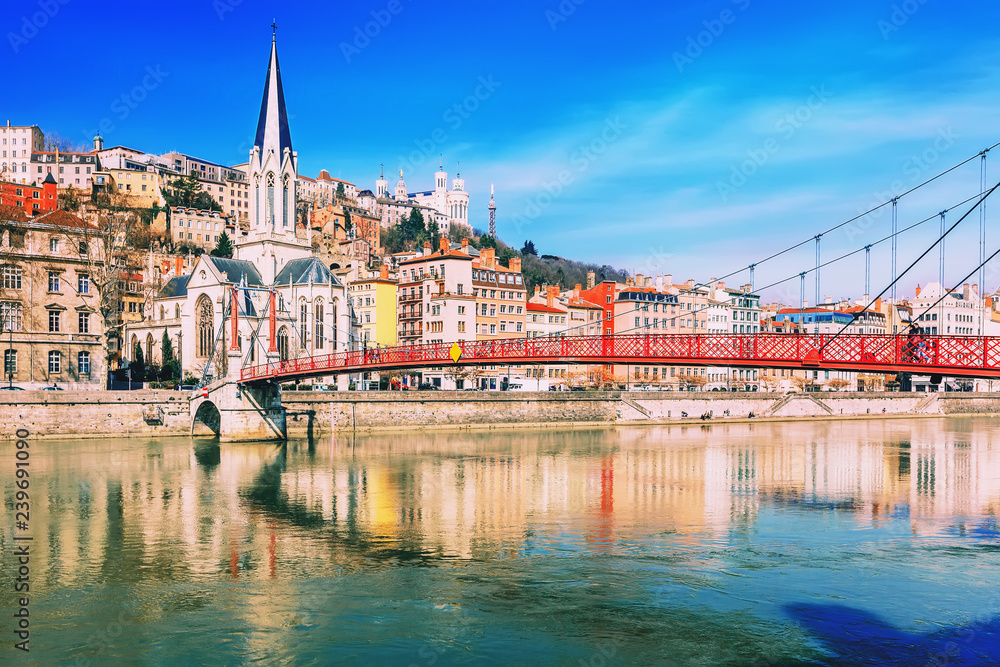 Fototapeta premium Saint Georges footbridge and the Saint Georges church in Lyon, France