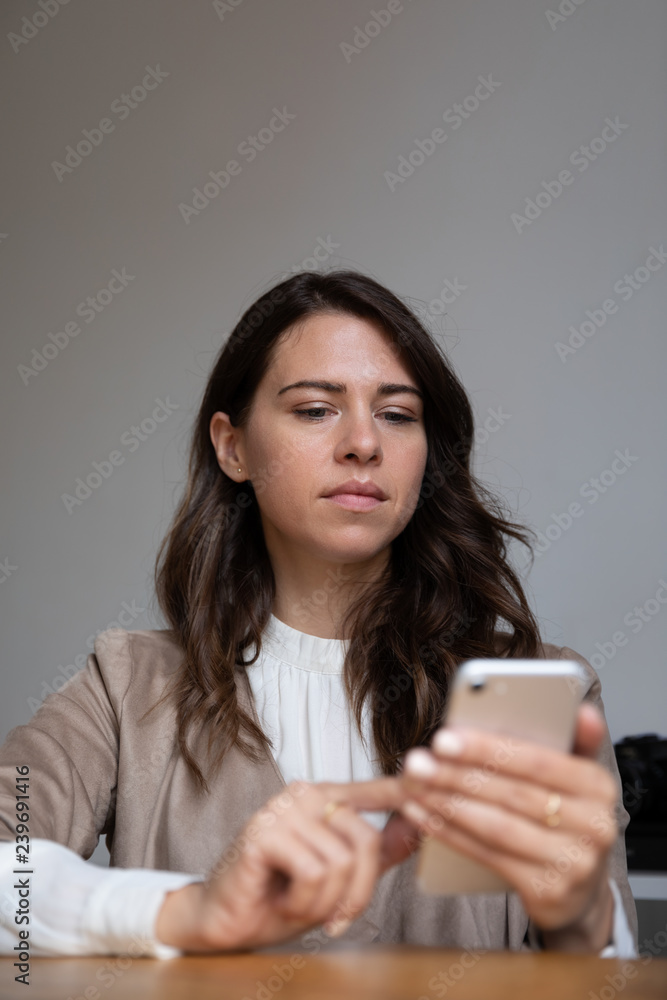 Young woman interacting with the mobile Young woman interacting with the mobile