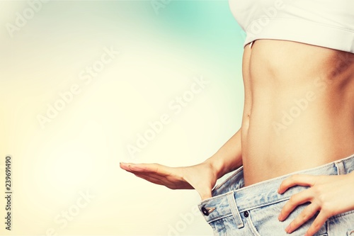 Close-up beautiful slim female body, thin woman, bokeh blur