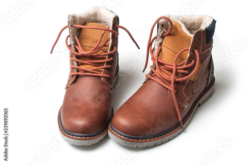 closeup of winter boots for men on white background
