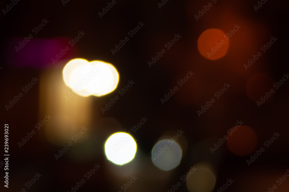 Blurred night background of city street road with bokeh effect. Abstract wallpaper for design and editing images. Blurred night background of city street road with bokeh effect. Abstract wallpaper for design and editing images.