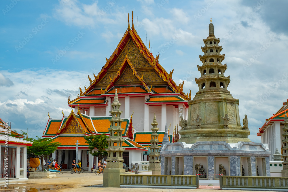 Bangkok Thailand, 07 July 2018, Tourist ride bicycle in temple in Thailand (Wat Kalayanamit) Bangkok Thailand, 07 July 2018, Tourist ride bicycle in temple in Thailand (Wat Kalayanamit)