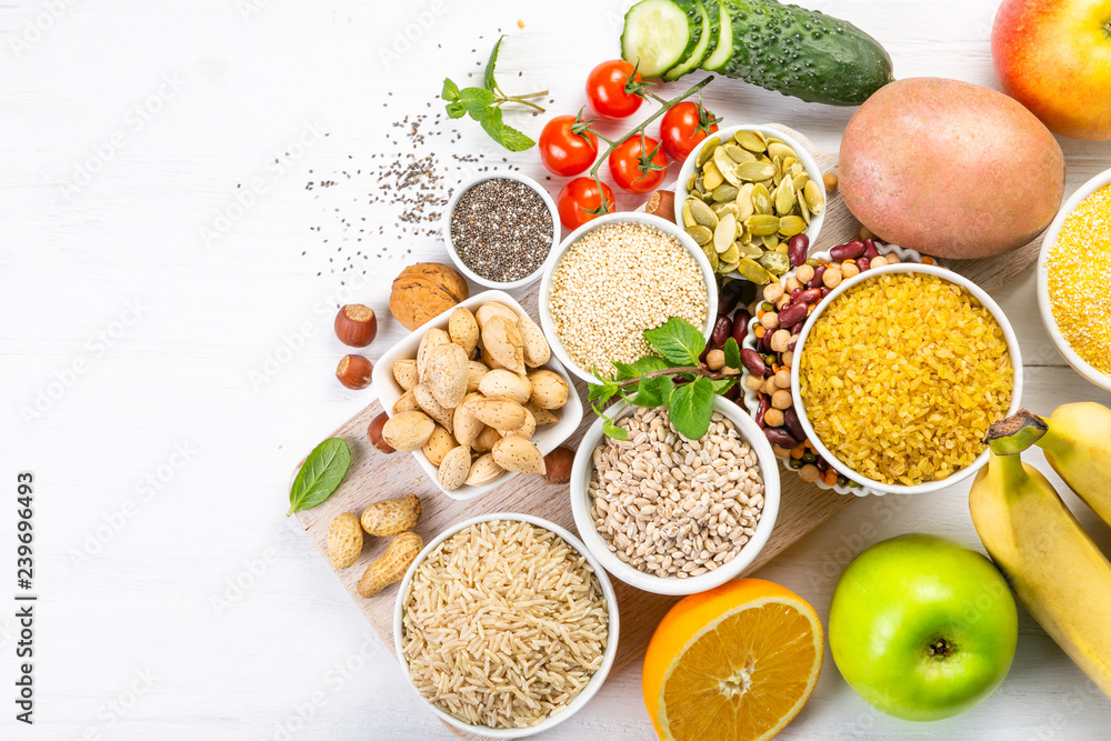 Selection of good carbohydrates sources - vegetables, fruits, grains, legumes, nuts and seeds. Healthy vegan diet Selection of good carbohydrates sources - vegetables, fruits, grains, legumes, nuts and seeds. Healthy vegan diet