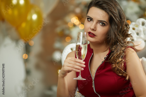 Smiling Woman Holding Glass Of Sparkling Wine Stock Photo