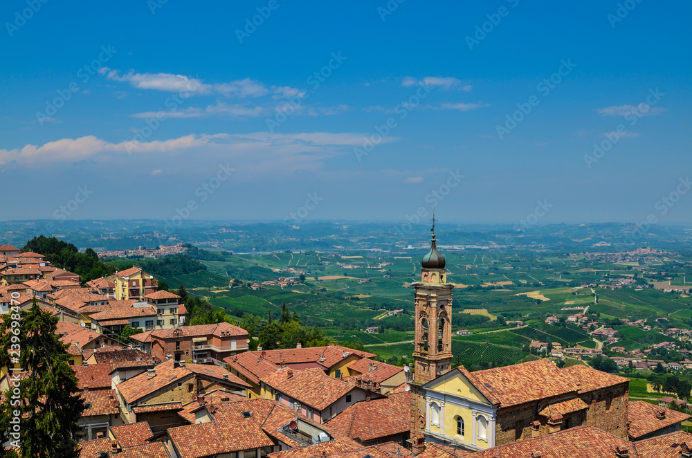 La morra, Piedmont, Italy. July 2018. Aerial view from the top of the bell tower. The red roofs and the countryside in the distance stand out. We are in the heart of the Langhe, land of fine wines.