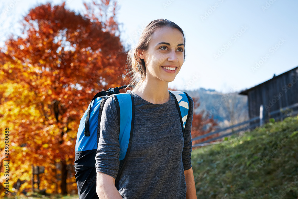 woman hiker with backpack walking outdoors woman hiker with backpack walking outdoors