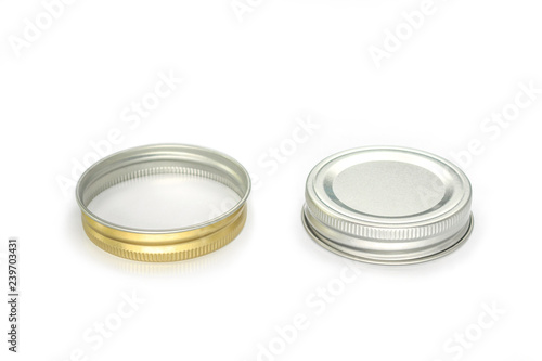 Jars lid golden color and silver color on white background.