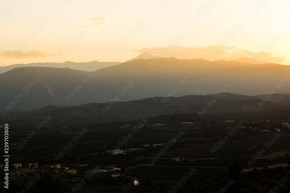 abstract country side suburb village local space in sun rise foggy morning weather time with mountain silhouette horizon background abstract country side suburb village local space in sun rise foggy morning weather time with mountain silhouette horizon background